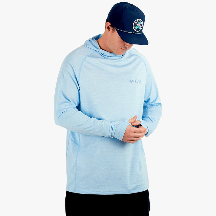 Airy Blue Heather $Model is 6'1" 190lbs Size L$