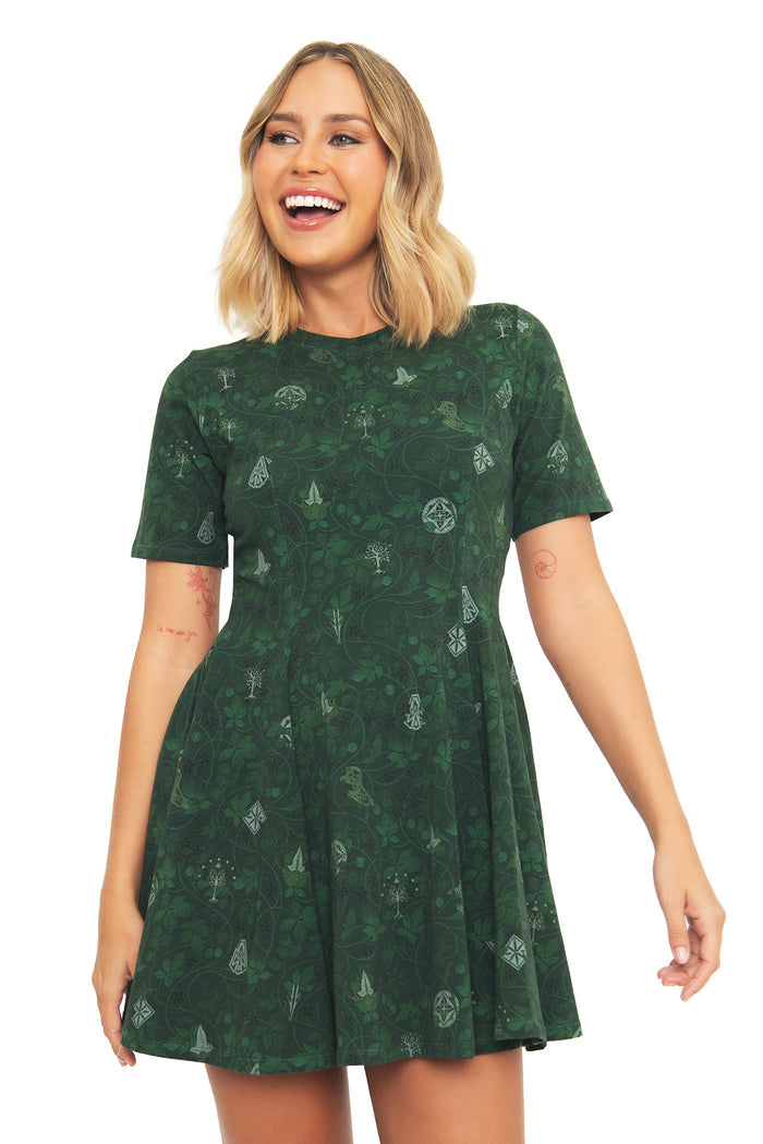 Close-up of the BlackMilk Lord of the Rings Bag End Wallpaper Evil Tee Dress, highlighting the detailed vine and Middle-earth icon print in dark green cotton.