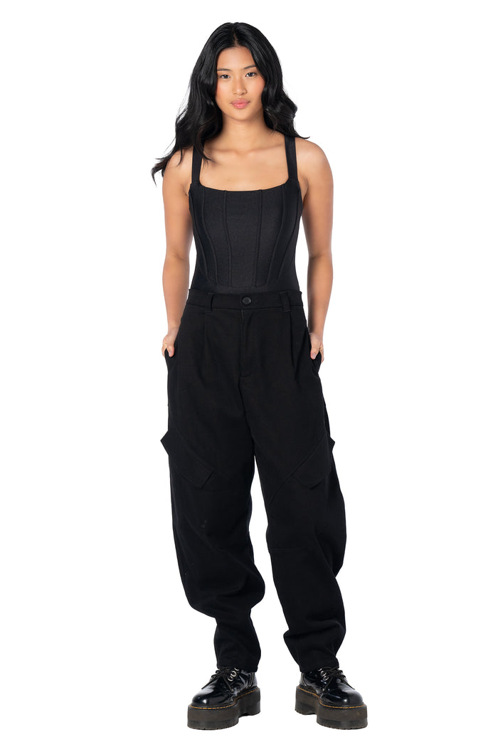 Streetwear-inspired black barrel leg cargo pants with functional utility pockets, flattering relaxed silhouette and soft stretch cotton fabric for versatile casual outfits.