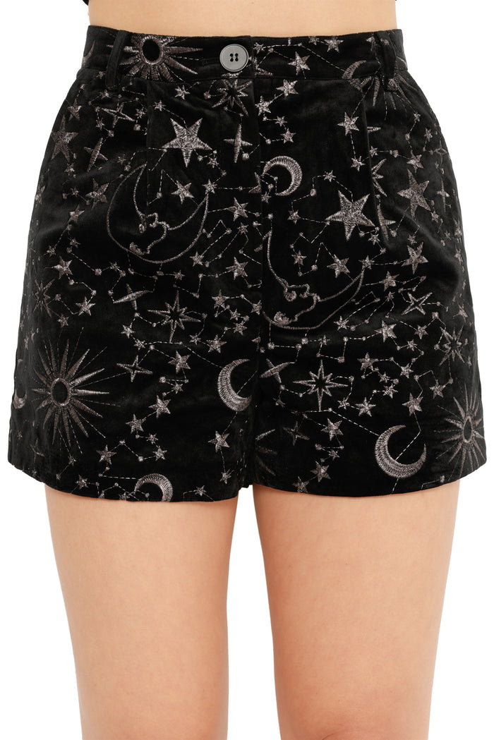 sparkly black festive shorts women’s holiday styling