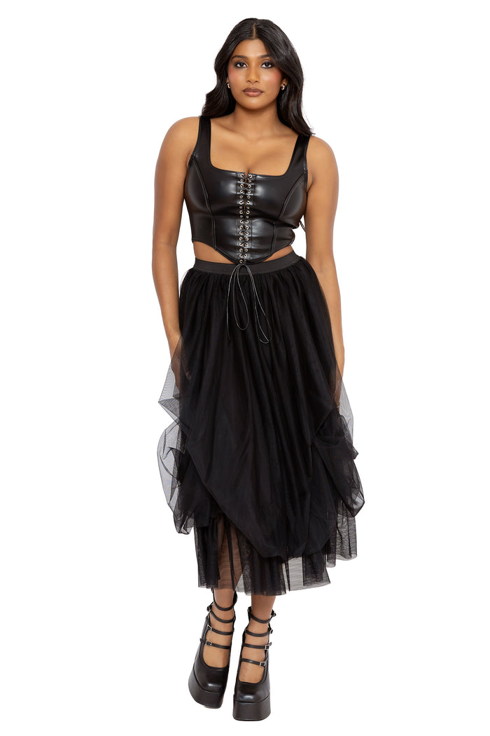 Corporate goth black tulle midi skirt with layered mesh fabric and elegant flowing volume for elevated gothic office styling. This alternative witch skirt blends dark academia and whimsigoth aesthetics with a romantic ballerina inspired silhouette.