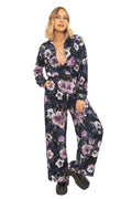 Alternative witchcore trousers featuring dark florals, hidden creepy crawlies and elegant gothic tailoring. These high waisted wide leg pants blend corporate goth and whimsigoth aesthetics with lightweight flowing fabric and polished office-ready styling.