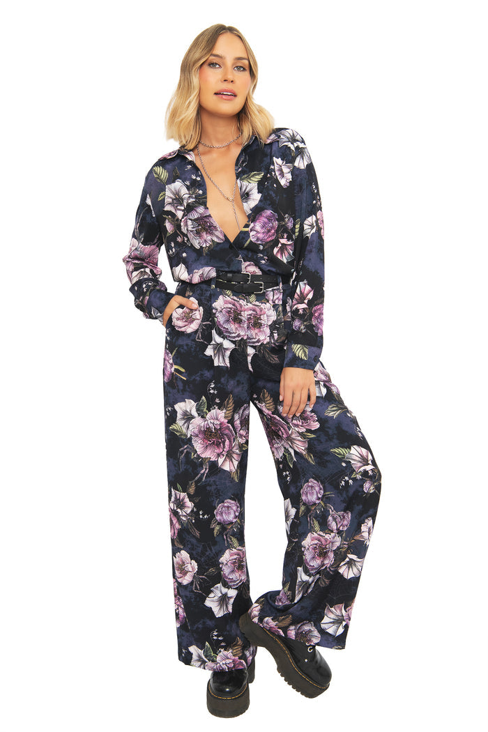 Alternative witchcore trousers featuring dark florals, hidden creepy crawlies and elegant gothic tailoring. These high waisted wide leg pants blend corporate goth and whimsigoth aesthetics with lightweight flowing fabric and polished office-ready styling.