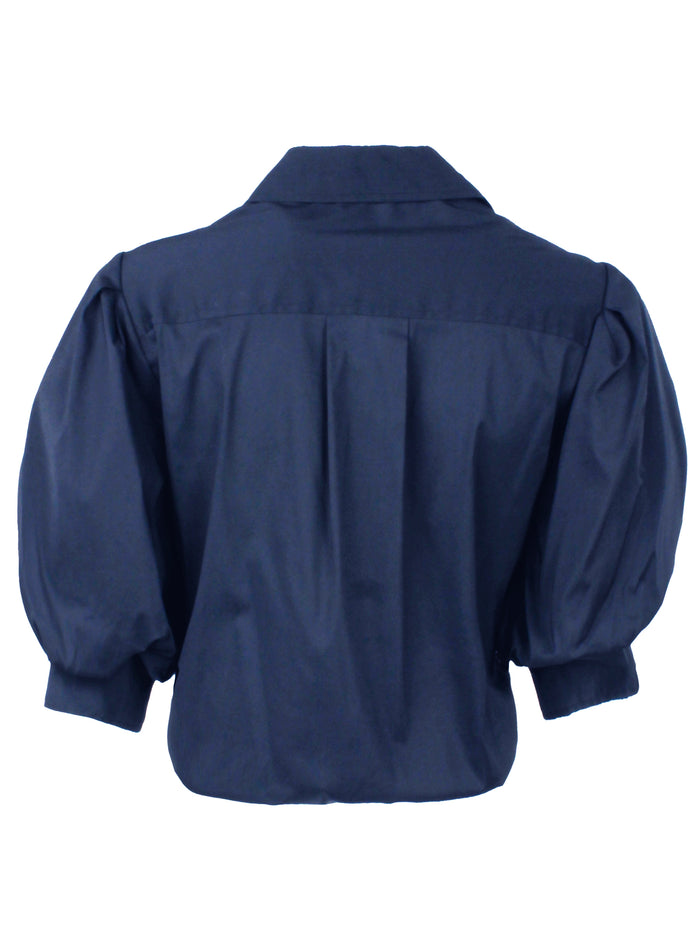 Back view of Finley Bomba navy poplin shirt with box-pleated back yoke and elasticized hem. Cropped, relaxed fit.