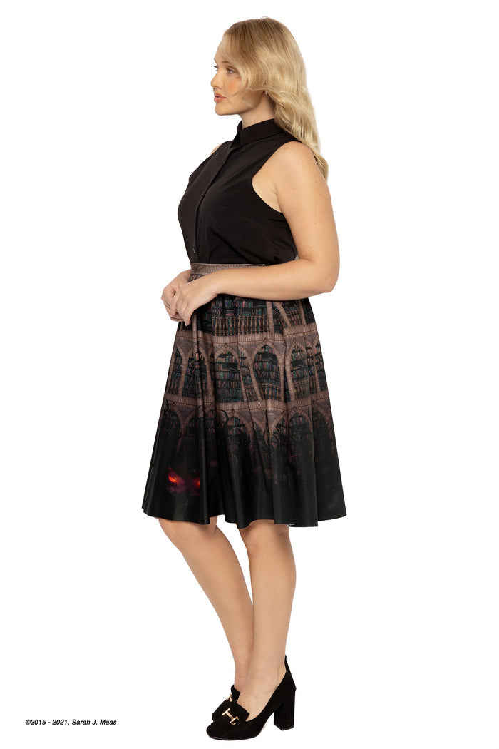 Bryaxis library midi skirt ACOTAR inspired, A Court of Thorns and Roses series skirt by Sarah J Maas with bookshelf print, shadowy figure detail, glowing eyes and flowing midi silhouette, fantasy fashion piece