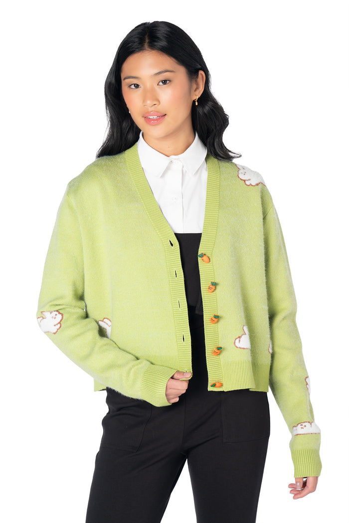 Green rabbit knit cardigan with a relaxed cropped silhouette, soft premium yarn and playful carrot-shaped buttons for whimsical everyday styling.