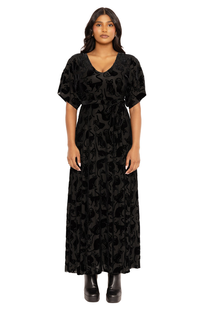 Alternative black maxi dress with cat print and burned velvet detailing, offering a flattering kimono-inspired shape perfect for gothic clothing, casual elegance, evening events and witchy statement outfits.