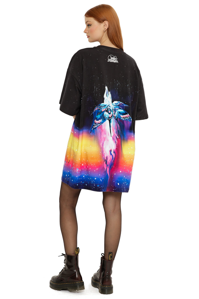 Oversized black giant tee showcasing fiery illustrated artwork fading into a colourful gradient hem.