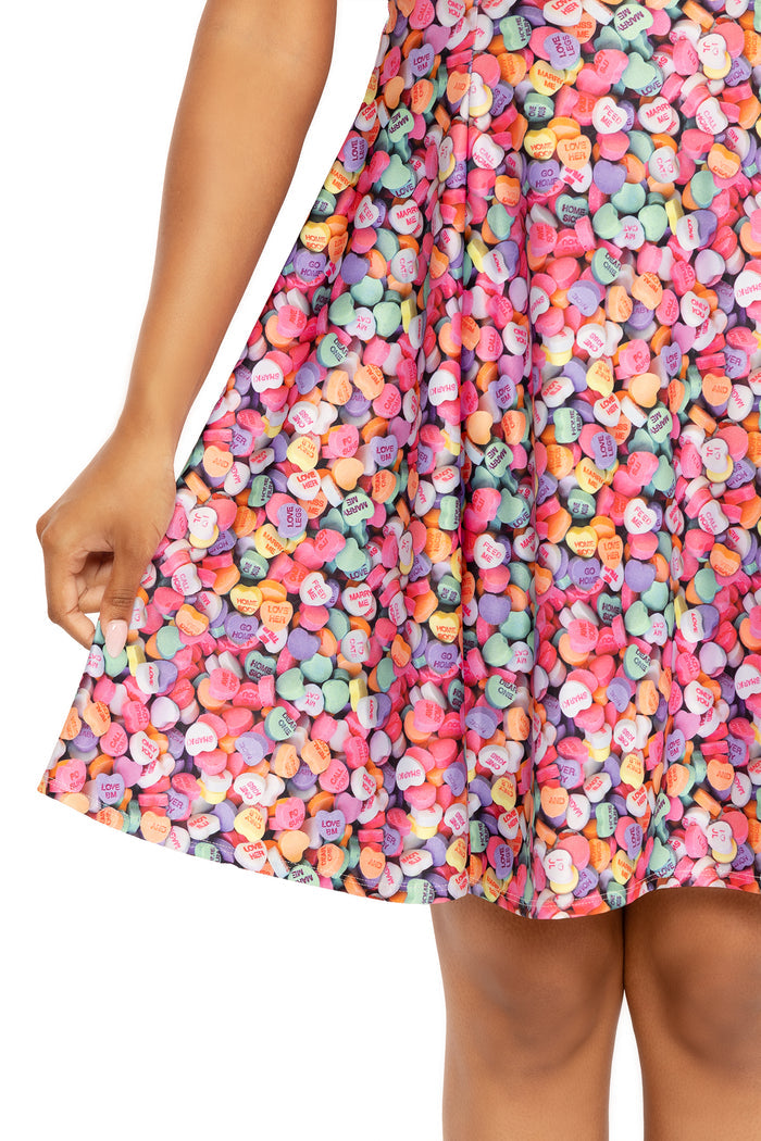 Playful heart print strappy dress for summer and weekend wear, designed with a relaxed longline silhouette perfect for picnics, holidays, day-to-night outfits and casual fashion.