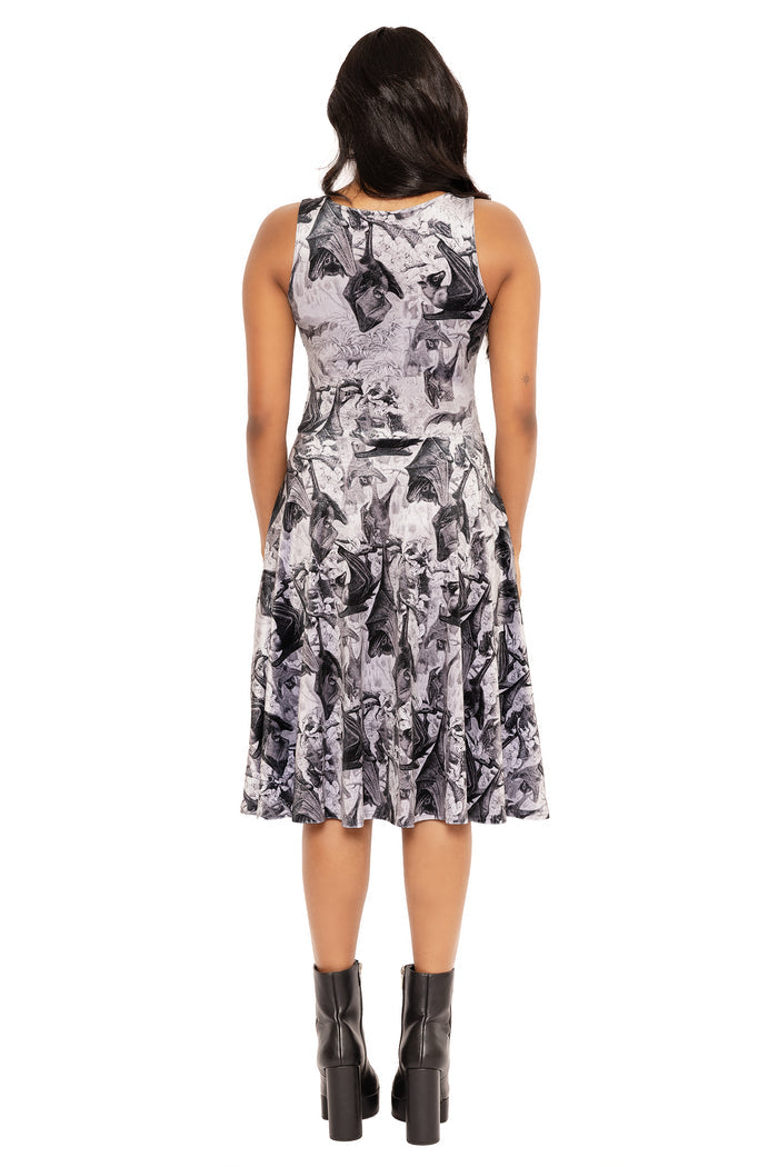 Soft stretch velvet midi dress with flattering princess silhouette, featuring detailed Cave Dwellers artwork perfect for alternative fashion, dark romantic styling and occasion dressing.