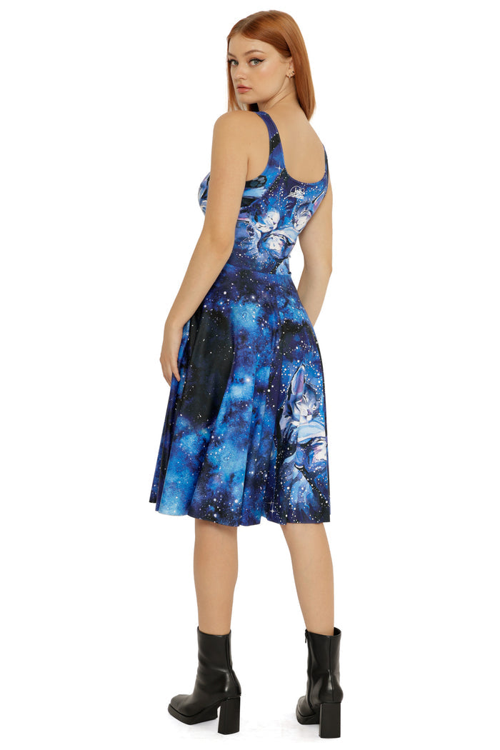 Cosmic midi dress from the Lora Zombie collection showcasing starry night tones and expressive illustrated artwork.