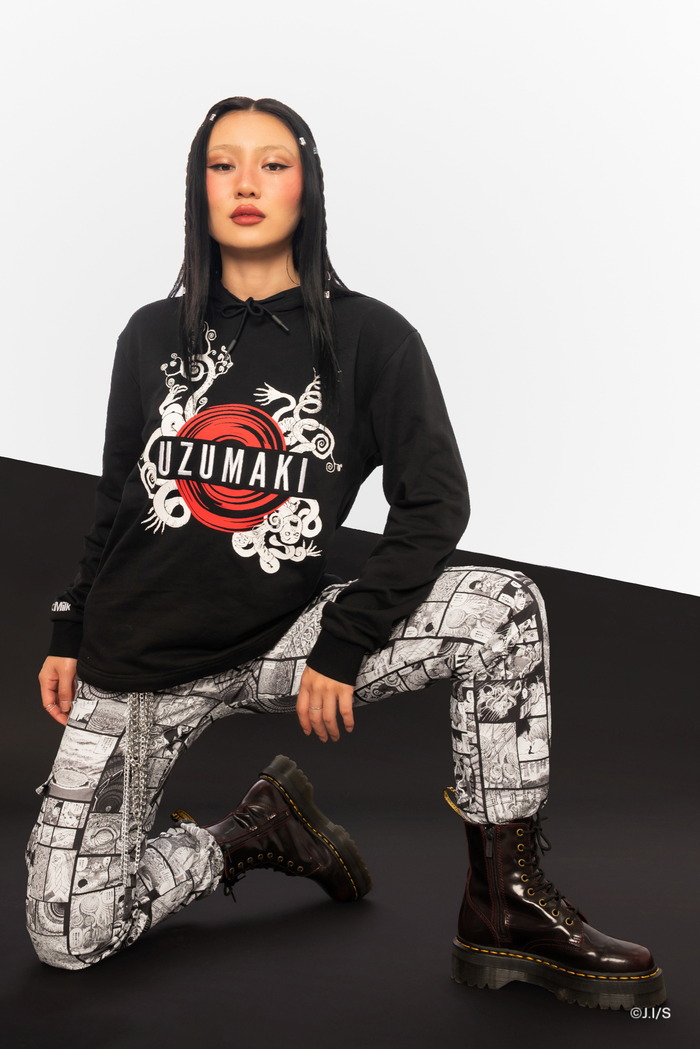 Monochrome graphic cargo pants for women, Junji Ito manga panel print trousers with high waist structure, straight leg silhouette and functional cargo pockets.