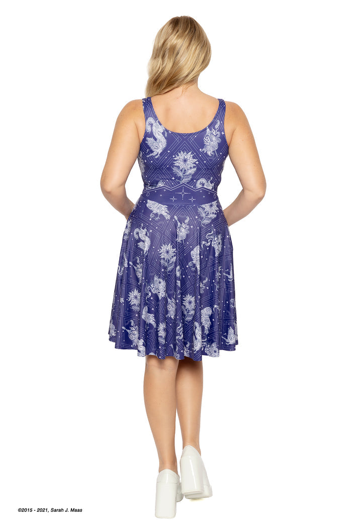 A Court of Thorns and Roses Court of Dreams longline dress, ACOTAR inspired scoop dress by Sarah J Maas with moon, stars and creature motifs, midnight tones, relaxed fit and pockets, Night Court aesthetic