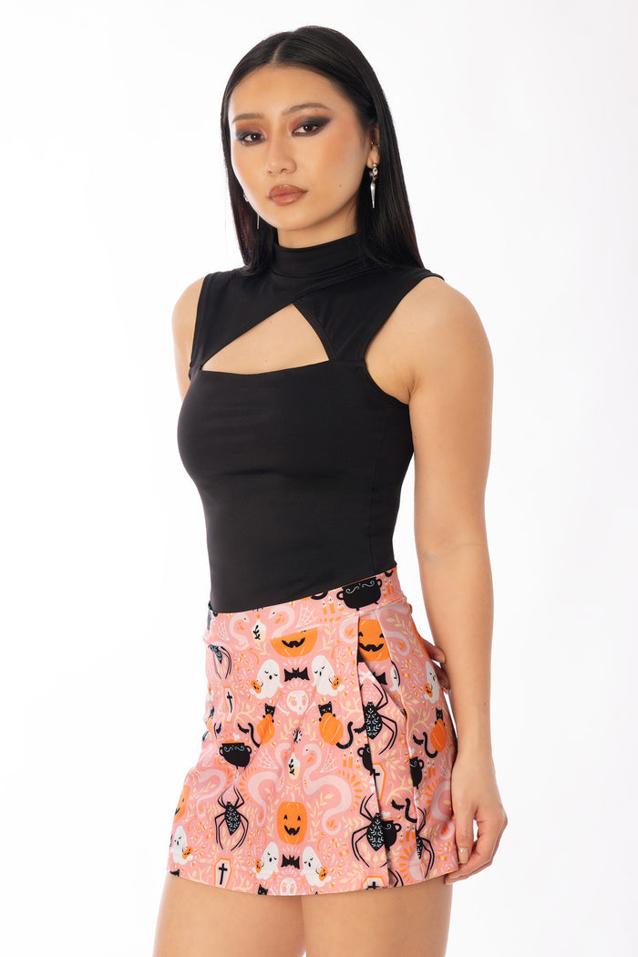 BlackMilk Coven Cutie Skort – pink witch, pumpkin and black cat Halloween print skort, part of the BlackMilk Clothing Halloween collection