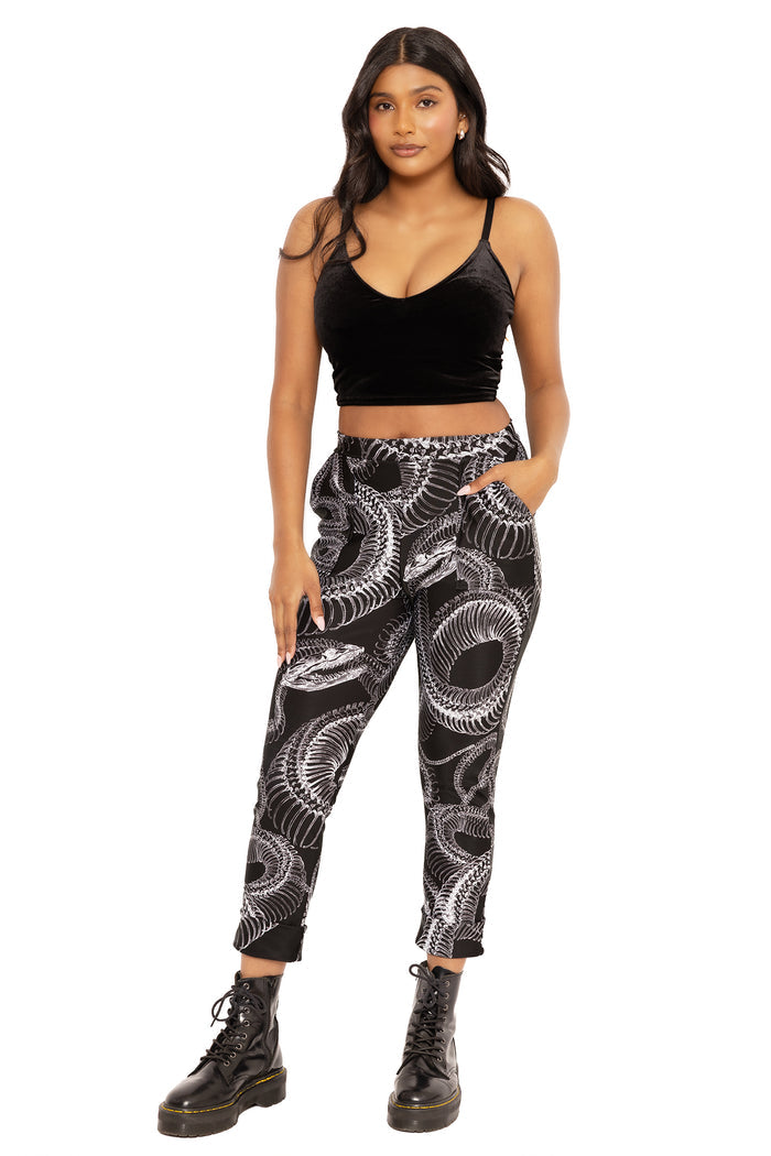 Dead Snake Cuffed Pants featuring a relaxed fit, cuffed ankles and striking snake print, perfect for alternative fashion, streetwear, casual outfits and everyday comfort.