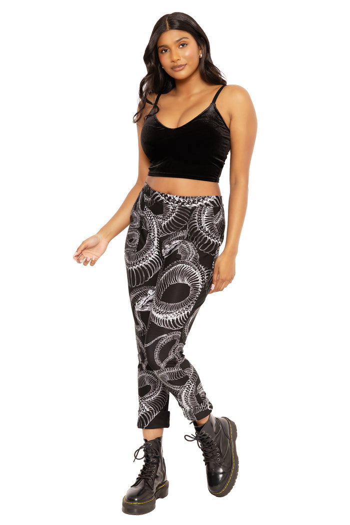 Relaxed fit snake print pants with elastic cuffs, ideal for casual styling, loungewear, streetwear looks and comfortable all-day wear.