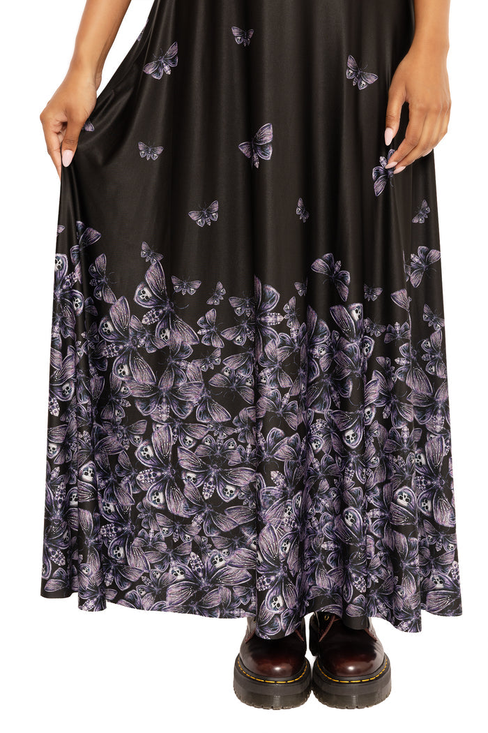 Women's gothic maxi dress with cap sleeves and moth artwork, combining a timeless shape with striking nature-inspired design for everyday and occasion wear.