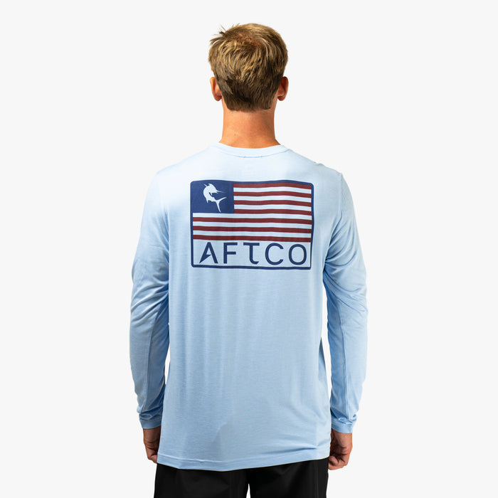 Airy Blue Heather $Model is 6'1" 175lbs Size L$