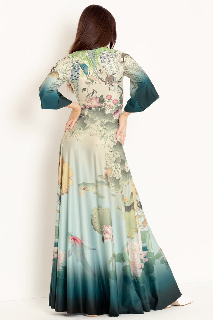 Flowing koi print maxi dress with dramatic sleeves, ideal for special occasions, garden parties, travel wardrobes and effortless day-to-night styling.
