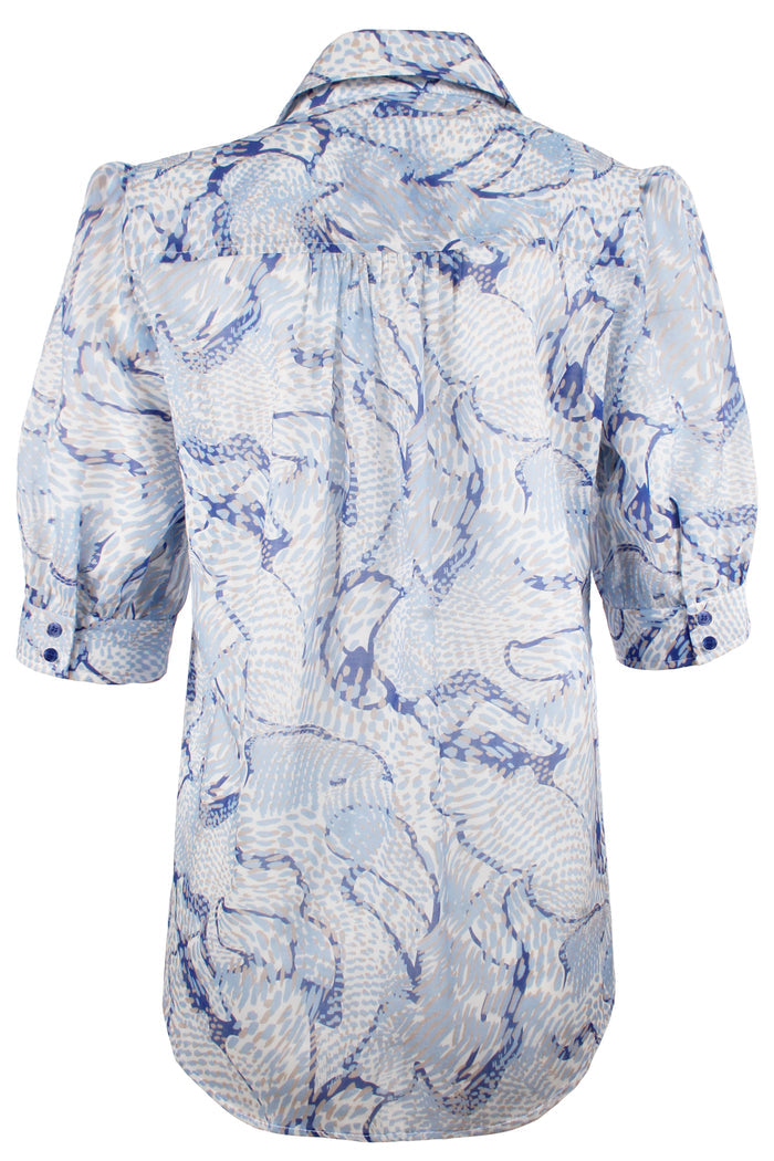 Blue and white patterned shirt on a white background