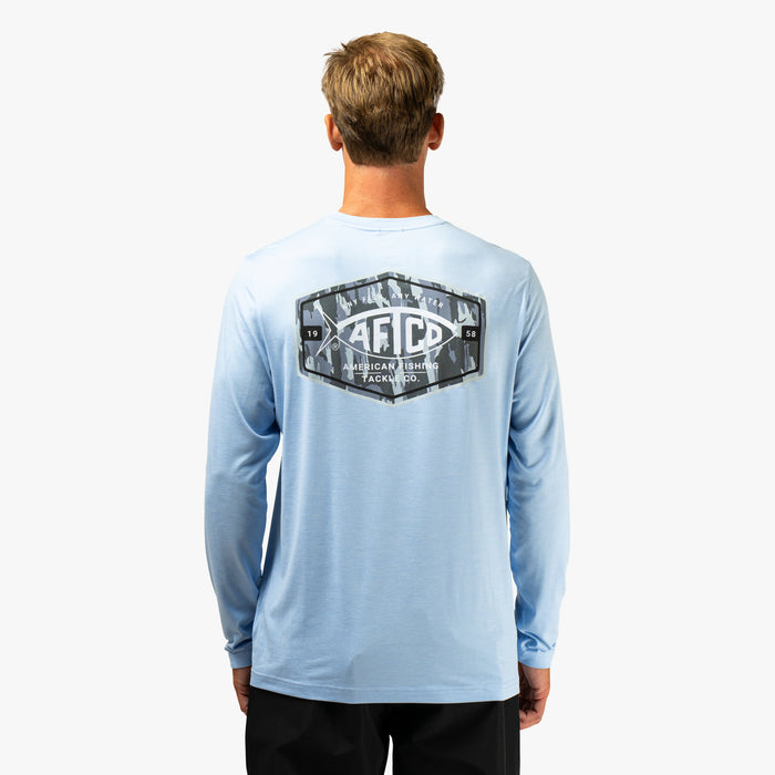 Airy Blue Heather $Model is 6'1" 175lbs Size L$