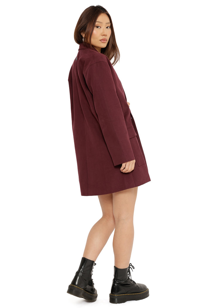 Fallout x BlackMilk long burgundy duster jacket with Fallout-themed Vault Boy detail and relaxed tailored fit.
