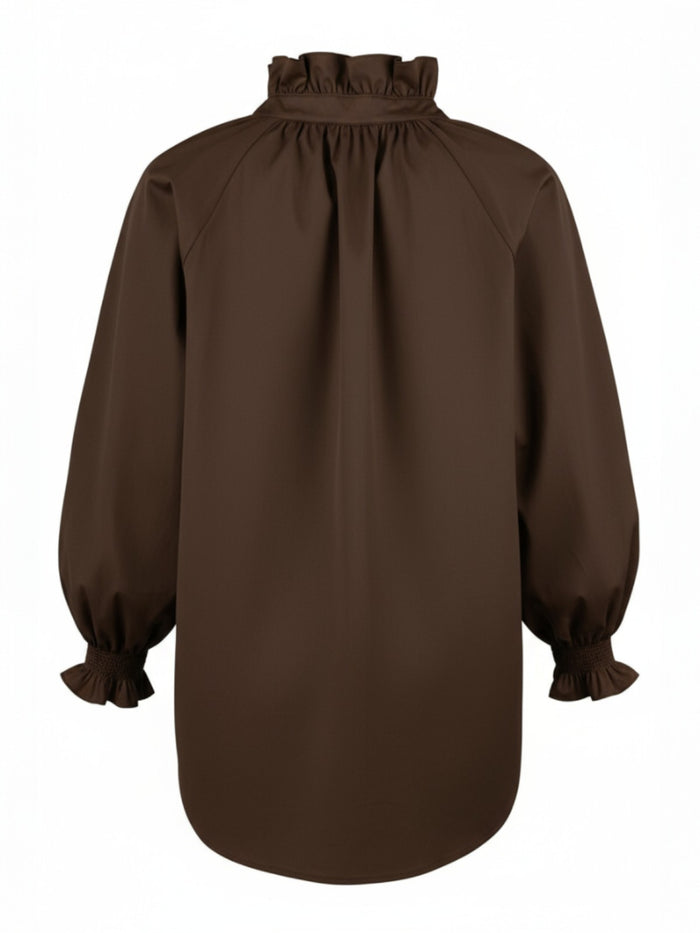 Brown blouse with puffed sleeves on a white background