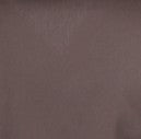 A close-up of a smooth, matte brown material texture.