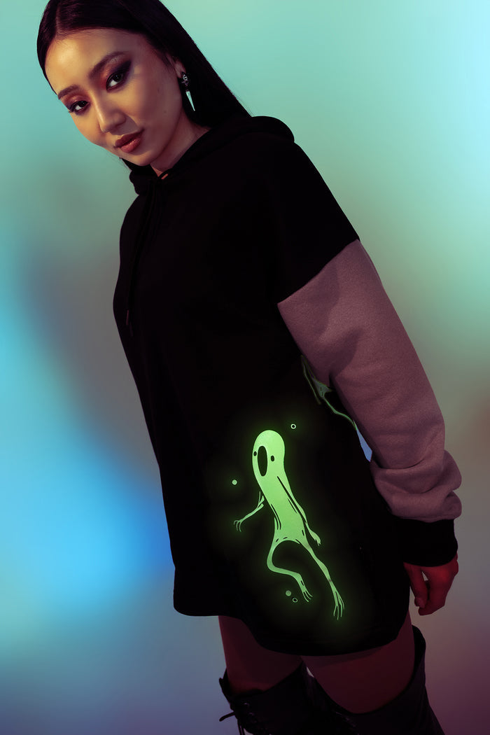 BlackMilk Ghost Party Comfy Hoodie – oversized unisex glow-in-the-dark ghost print Halloween hoodie in black and purple, part of the BlackMilk Clothing Halloween collection