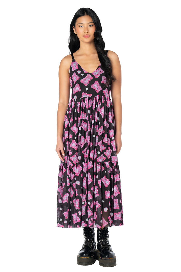 Alternative black mesh dress showcasing an all-over gummy bear print with a sheer midaxi silhouette, adjustable straps and lightweight layered fabric that moves beautifully.
