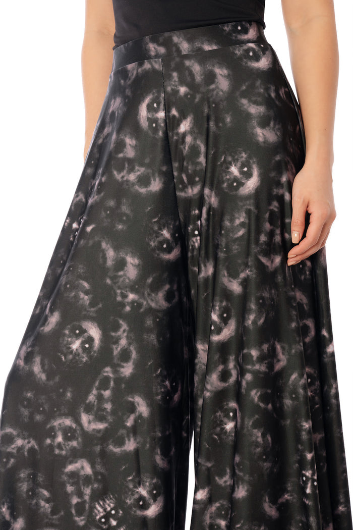 BlackMilk Horror Bound Palazzo Pants – grey trapped-souls print high-waisted wide-leg Halloween palazzo pants, part of the BlackMilk Clothing Halloween collection