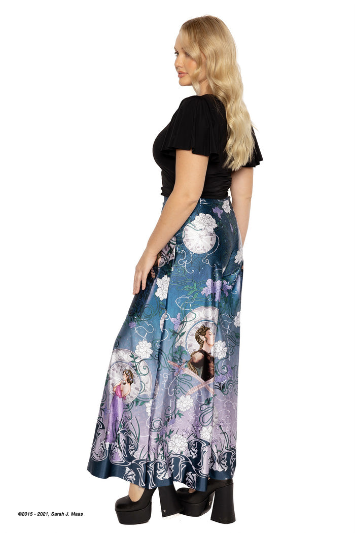 ACOTAR series House of Archeron palazzo pants, inspired by A Court of Thorns and Roses books by Sarah J Maas, featuring character artwork of Feyre, Nesta and Elain, floral motifs and relaxed wide leg silhouette