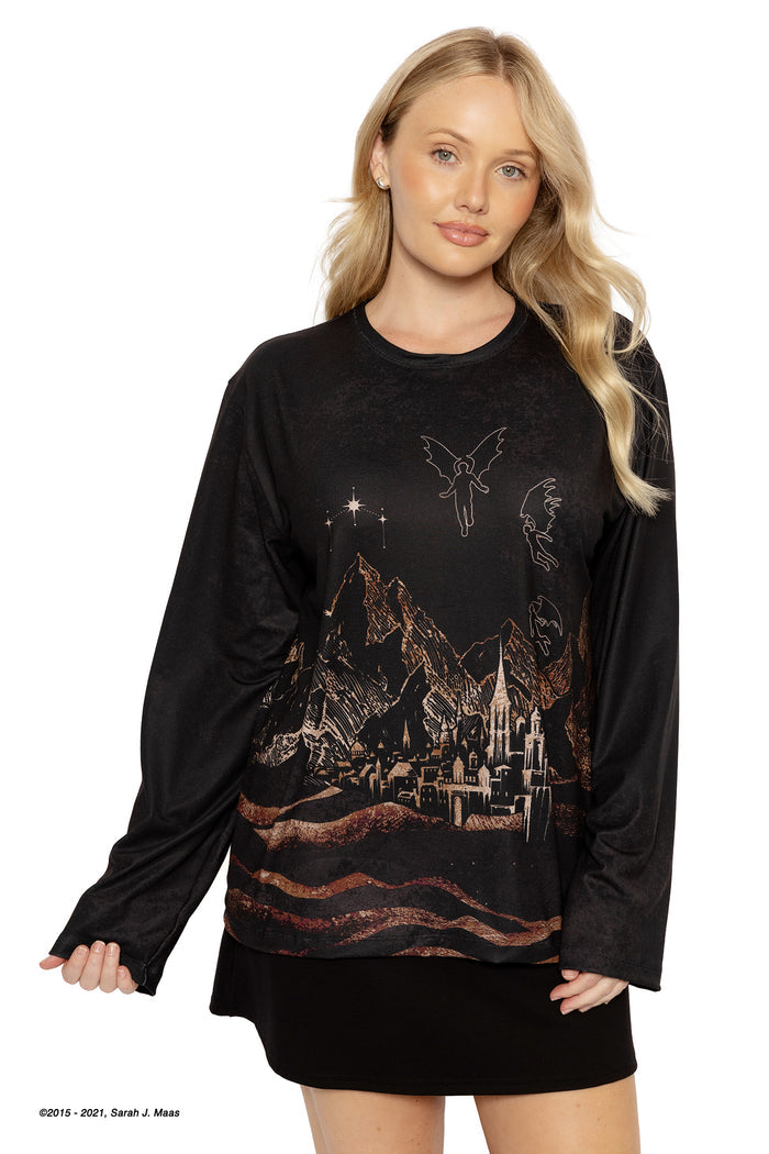 A Court of Thorns and Roses Illyrian long sleeve tee, ACOTAR inspired boyfriend t-shirt by Sarah J Maas with Velaris skyline print, winged warriors, relaxed oversized fit and graphic back design