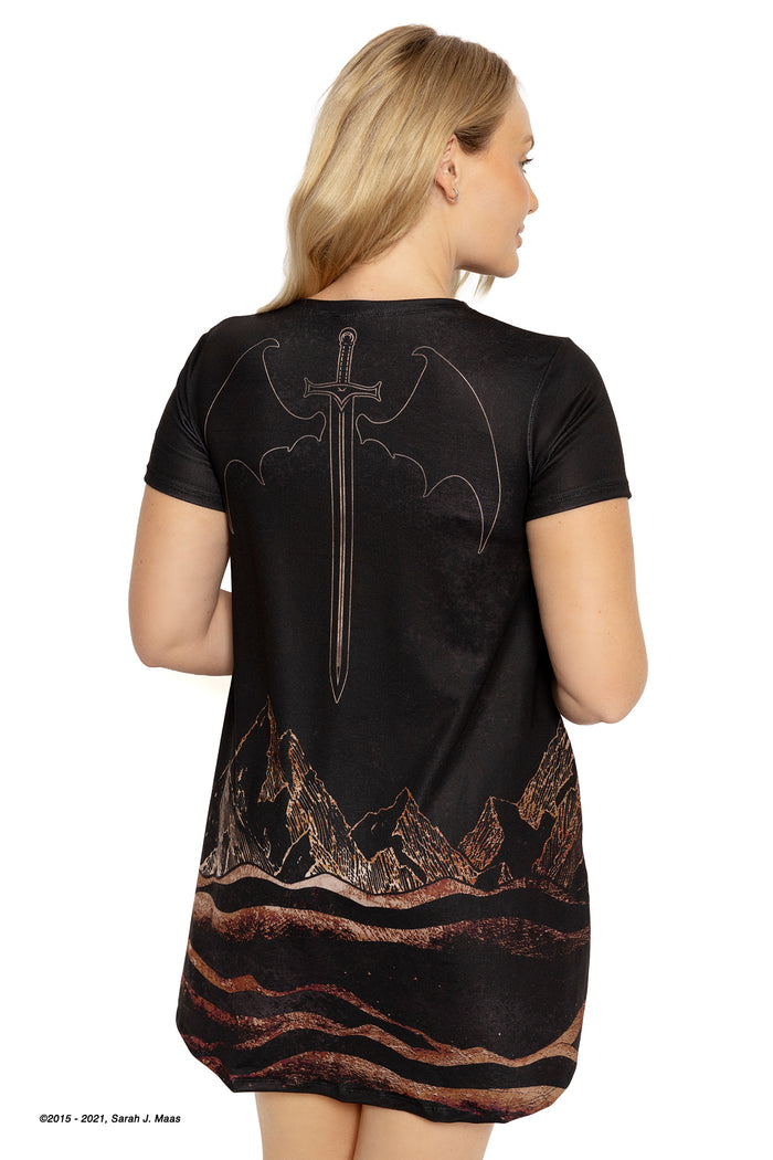 A Court of Thorns and Roses Illyrian dress, ACOTAR inspired swing tee dress by Sarah J Maas with Night Court artwork, winged warriors, celestial details and relaxed fit with dipped hem and pockets