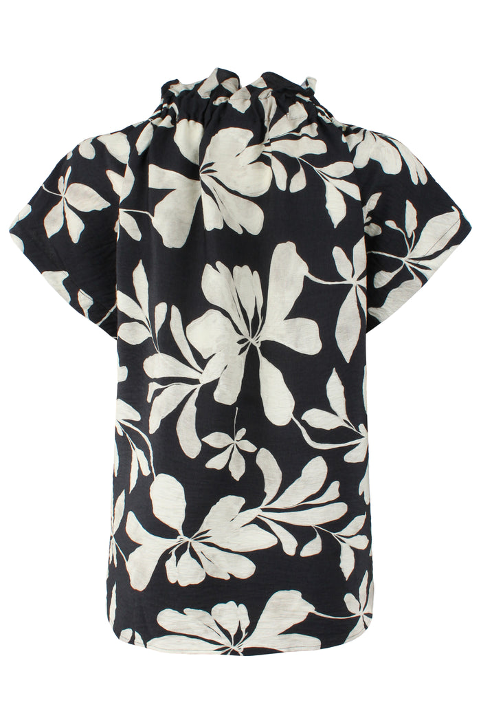 Black blouse with white floral pattern on a white background