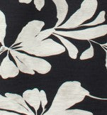 White floral pattern on a black background