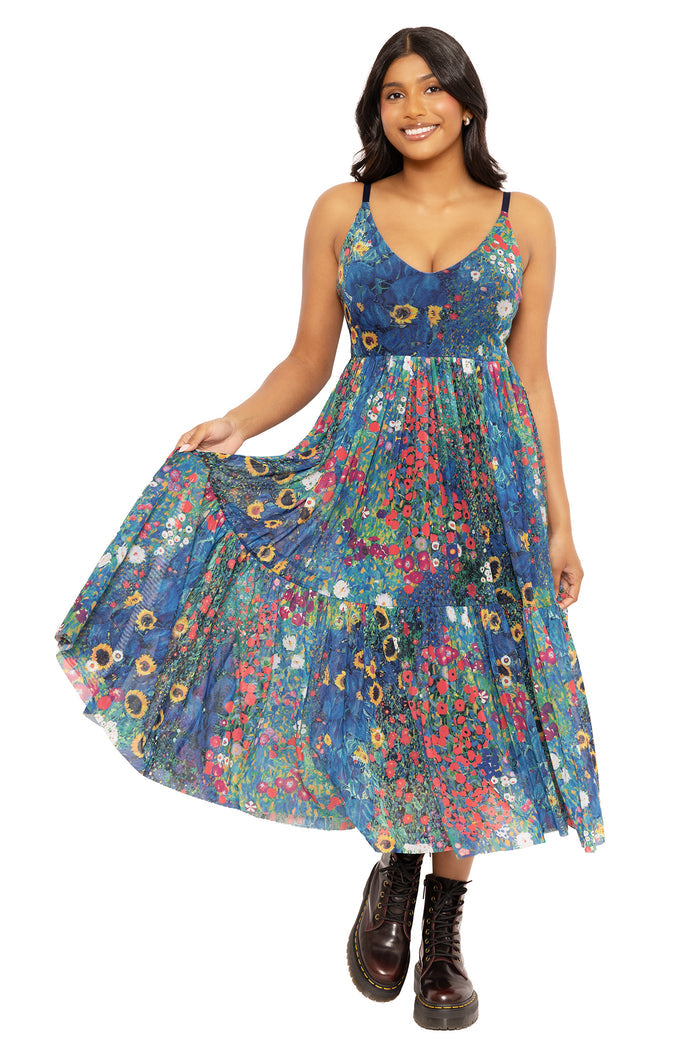 Sheer mesh midaxi dress with Klimt-inspired collage artwork, combining artistic style and effortless elegance for parties, weddings and sophisticated everyday outfits.