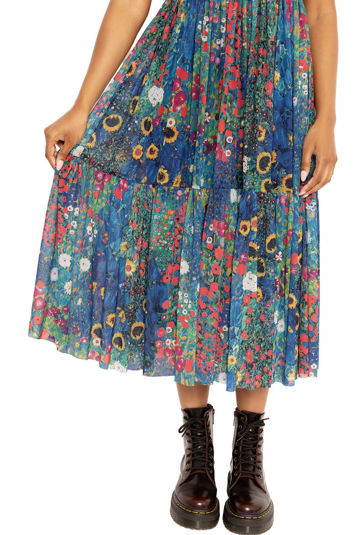 Sheer panel midaxi dress featuring a colourful Klimt collage artwork, combining comfort and sophistication for weddings, parties and creative fashion lovers.