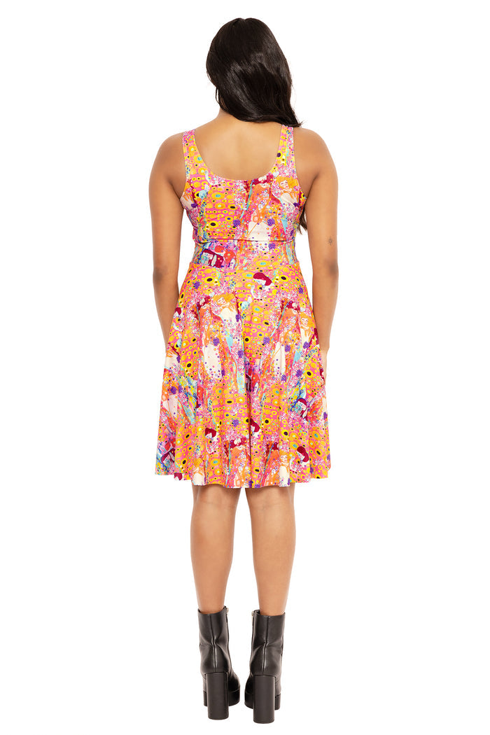 Water Serpent print scoop neck dress inspired by Gustav Klimt, combining statement artwork and effortless elegance for occasion wear and everyday fashion.