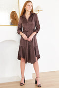 Woman wearing Leonardo, a brown Finley dress with a tie front in micro satin chocolate