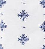 Pattern of blue snowflakes on a white background