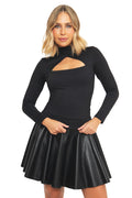 Full-length styled look of the BlackMilk Matte Black Triangulation Long Sleeve Top paired with a black faux-leather skater skirt and boots, a gothic streetwear outfit from the Lord of the Rings collection.