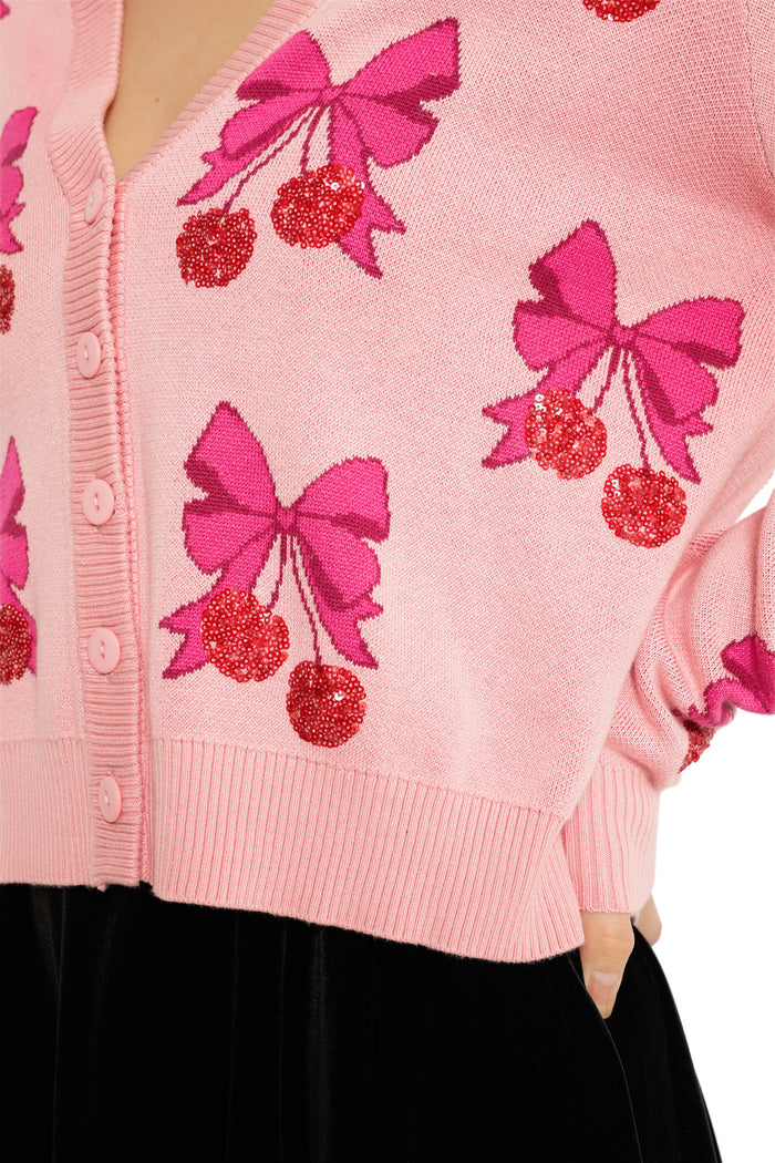 women’s pink knit cardigan christmas outfit idea