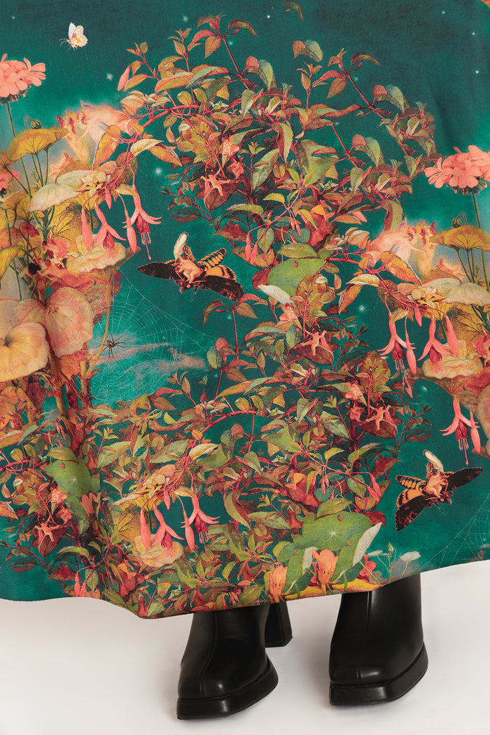 Rio maxi dress featuring whimsical fairy artwork, perfect for garden parties, creative fashion lovers, vacations and romantic occasion dressing.