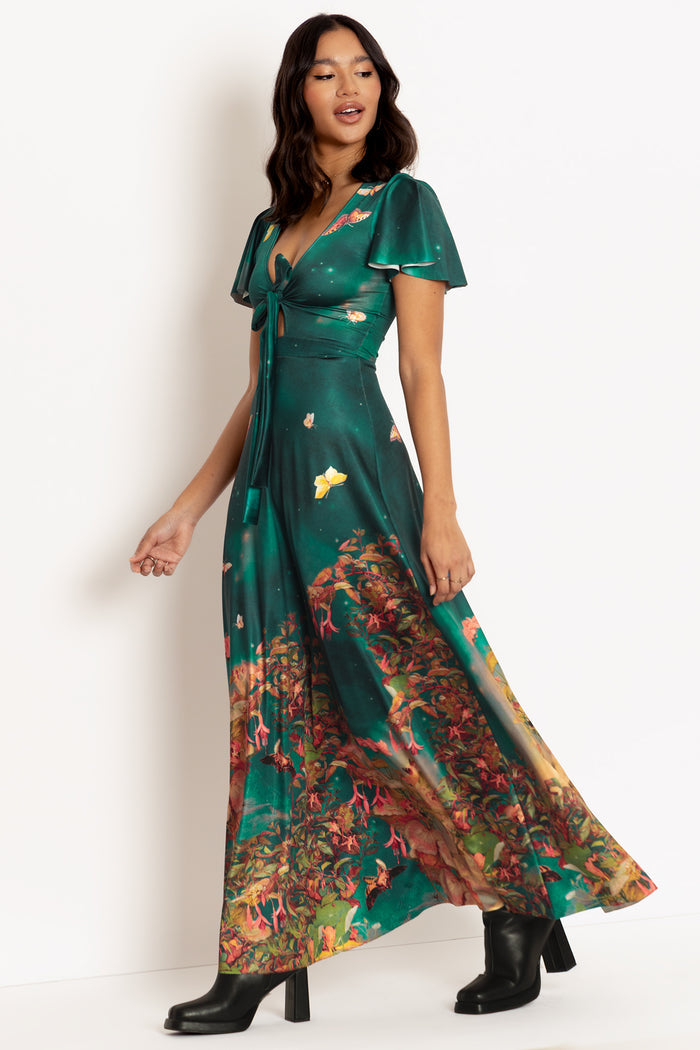 Midsummer fairy print maxi dress with flowing silhouette, designed for special events, summer celebrations and enchanting everyday outfits.