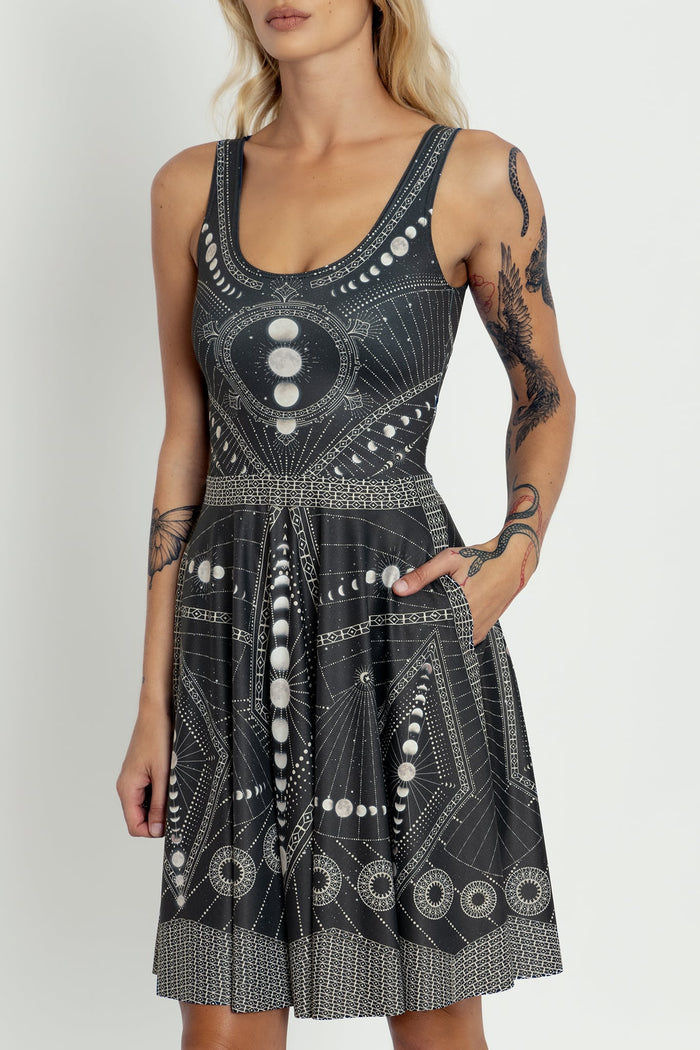 BlackMilk Moon Phases dress in black with celestial moon cycle print, sleeveless scoop neck skater dress, longline length and fitted bodice