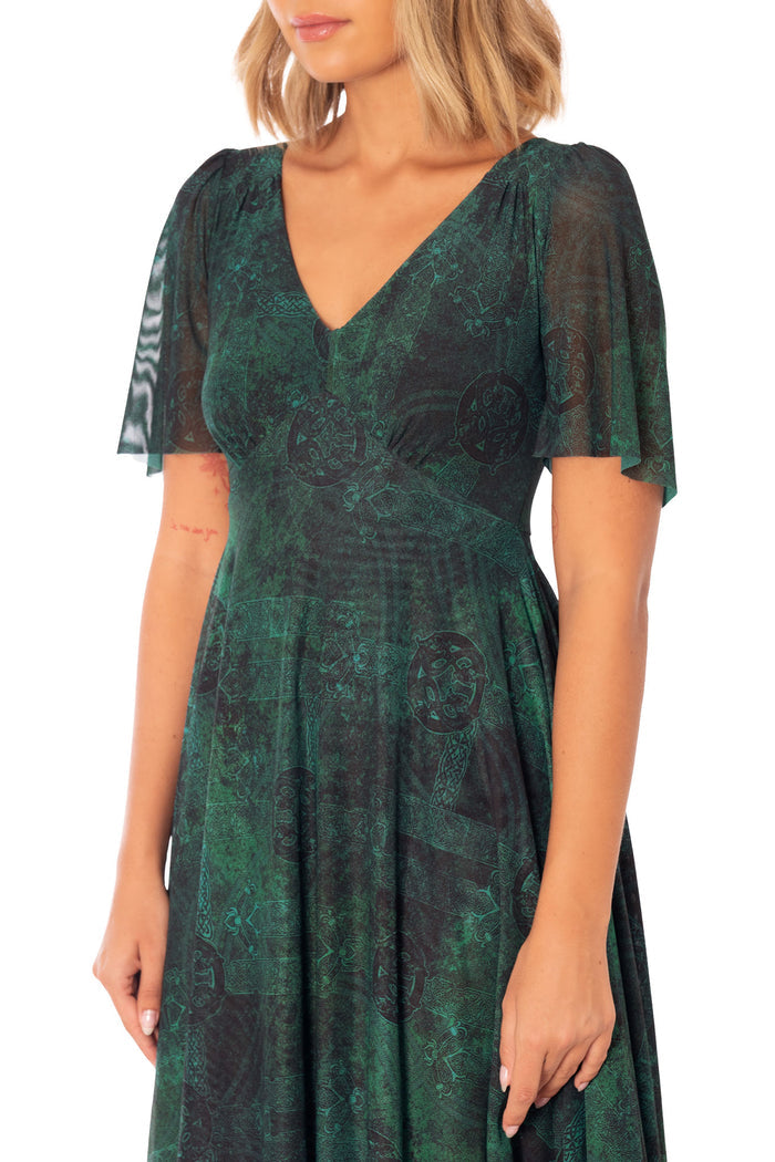 BlackMilk Moss Maiden Handkerchief Short Sleeve Dress front studio image showing v neck dress with flutter sleeves, handkerchief hem and dark green fantasy print
