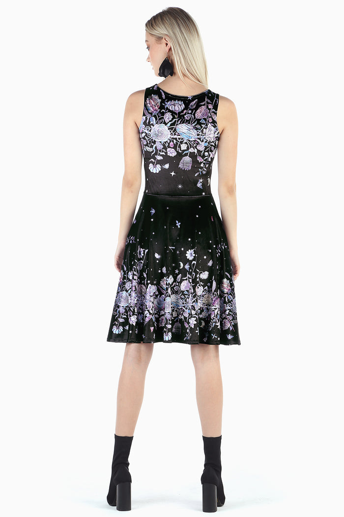 Mother Of Pearl Velvet Princess Longline Dress in printed velvet with sleeveless bodice, fitted waist and flowing flared longline skirt