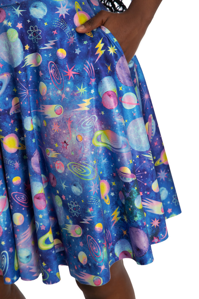 Women's longline dress with retro graphic print and peephole detail, perfect for creative workplaces, casual events, travel wardrobes and versatile styling.