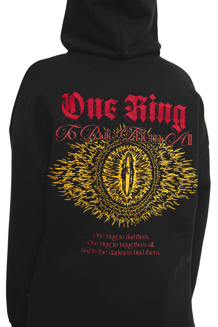 Close-up of the One Ring to Rule Them All back graphic on the BlackMilk hoodie, featuring the fiery Eye of Sauron and Ring verse embroidered in red and gold — a bold gothic streetwear statement inspired by Middle-earth.